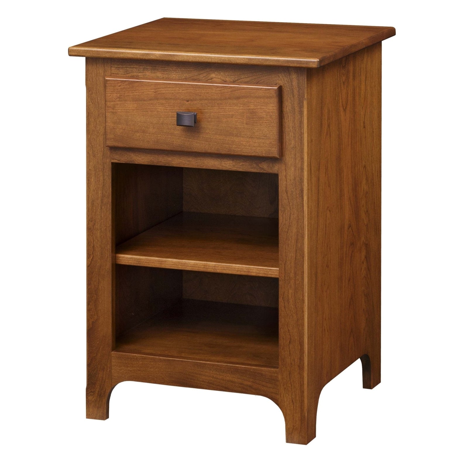 Small cherry open nightstand with one drawer, black bar pull and two open shelves holding books beside a bed