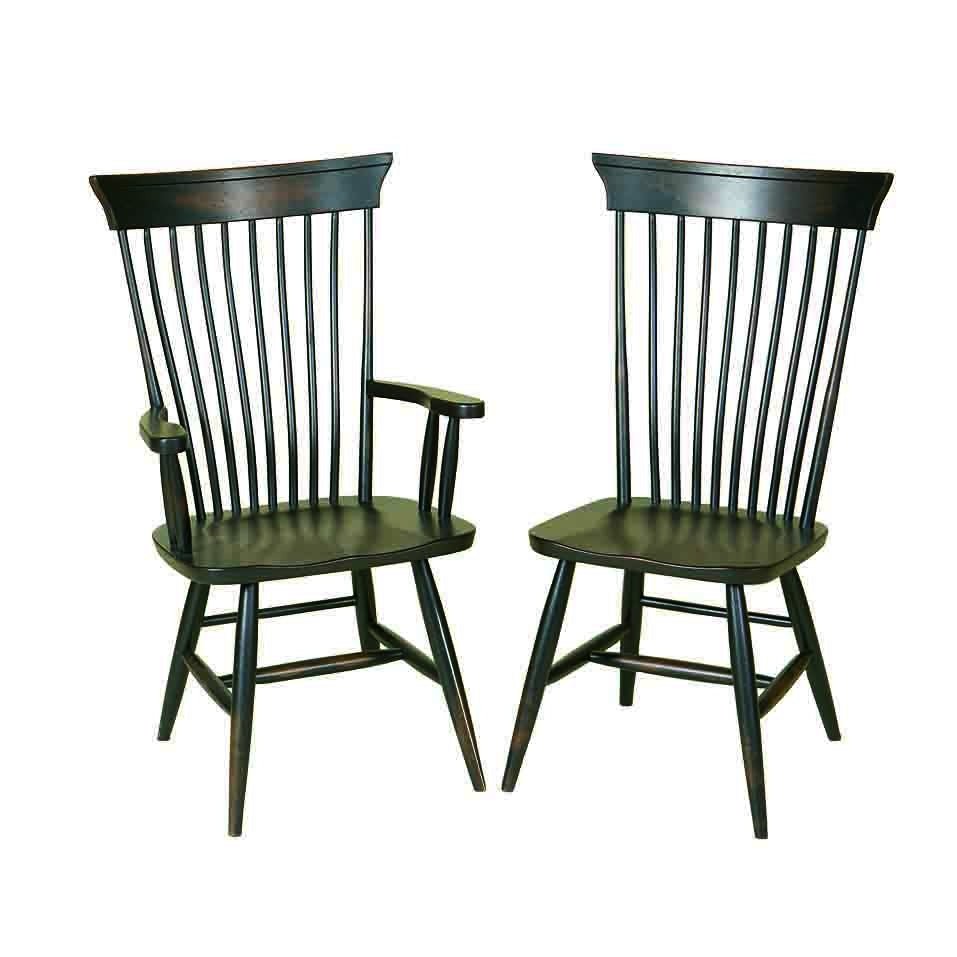 Pair of black Windsor chairs, one arm chair and one side chair, with tall spindle backs and scooped seats