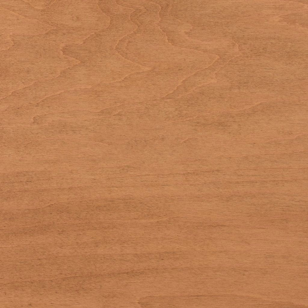 Provincial stain on maple, a light golden brown swatch with cloudy figure and a smooth surface