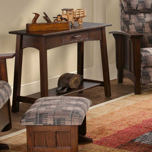 Dark walnut Santa Fe console table with drawer and lower shelf displaying a toy truck, hand plane and antique pulley