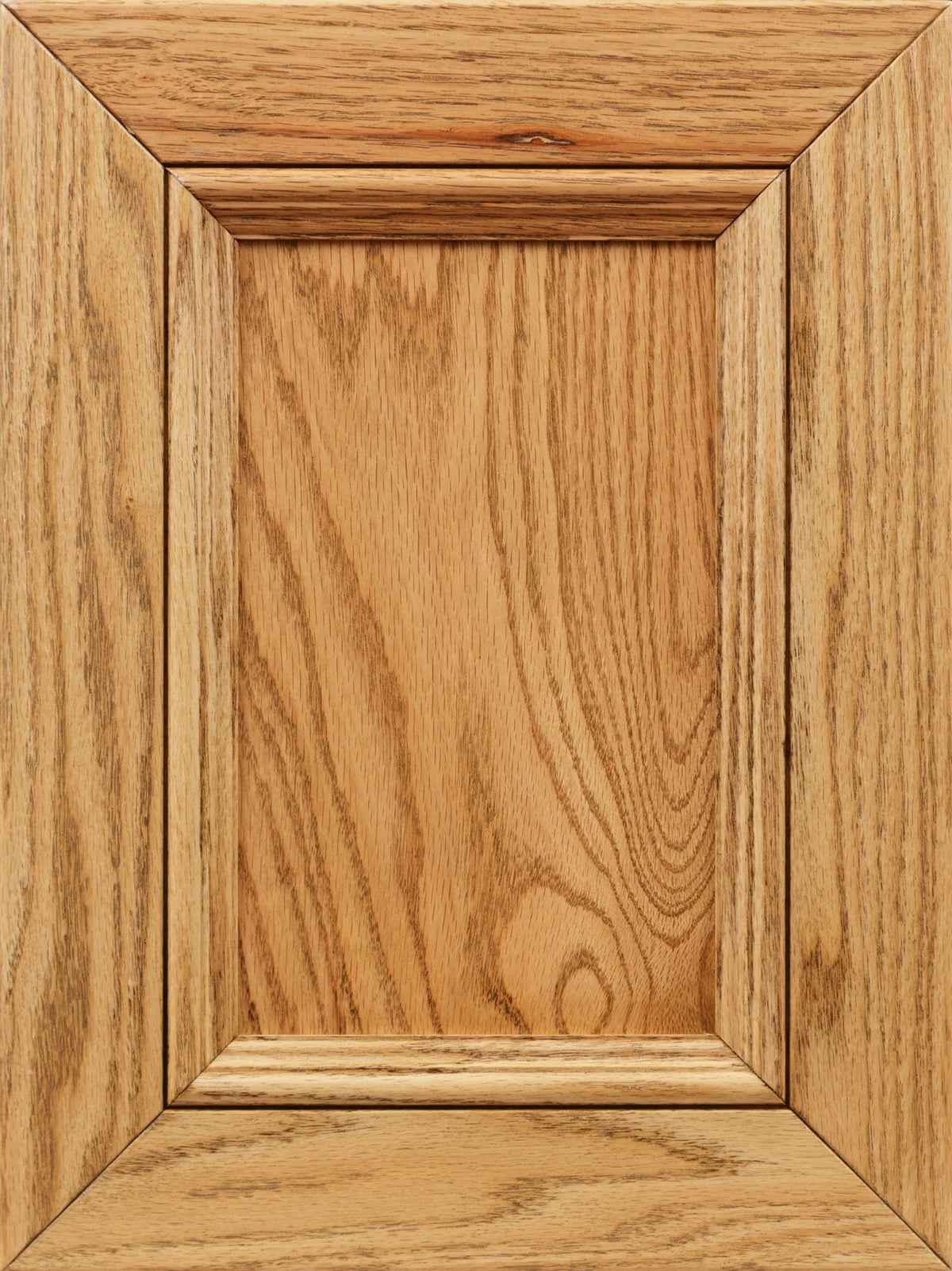 Provincial stain on oak wood sample, a natural wheat toned raised-panel door with prominent oak grain lines and small knot