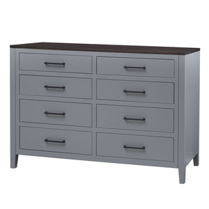 Two-tone dresser with a gray painted case, dark stained top and eight drawers with black bar pulls, shown at an angle