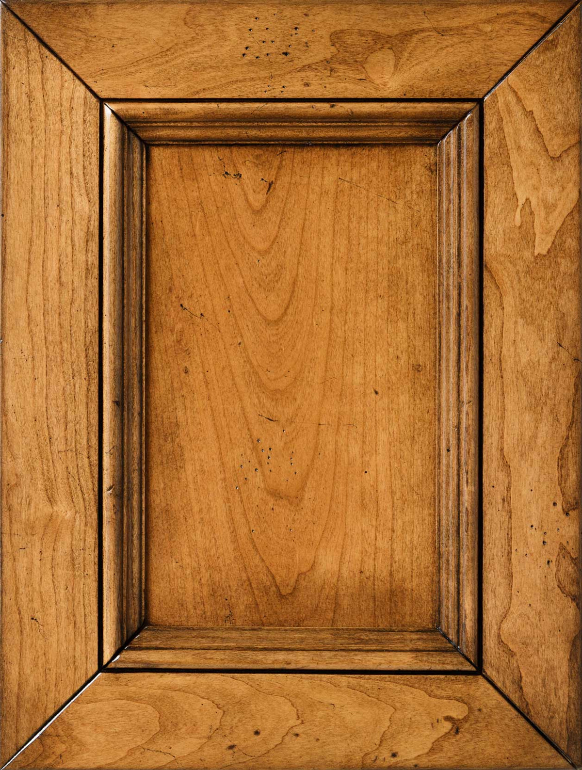Vintage Buxton stain on cherry sample, a muted grayish tan panel door with dark glazed molding and subtle distressing